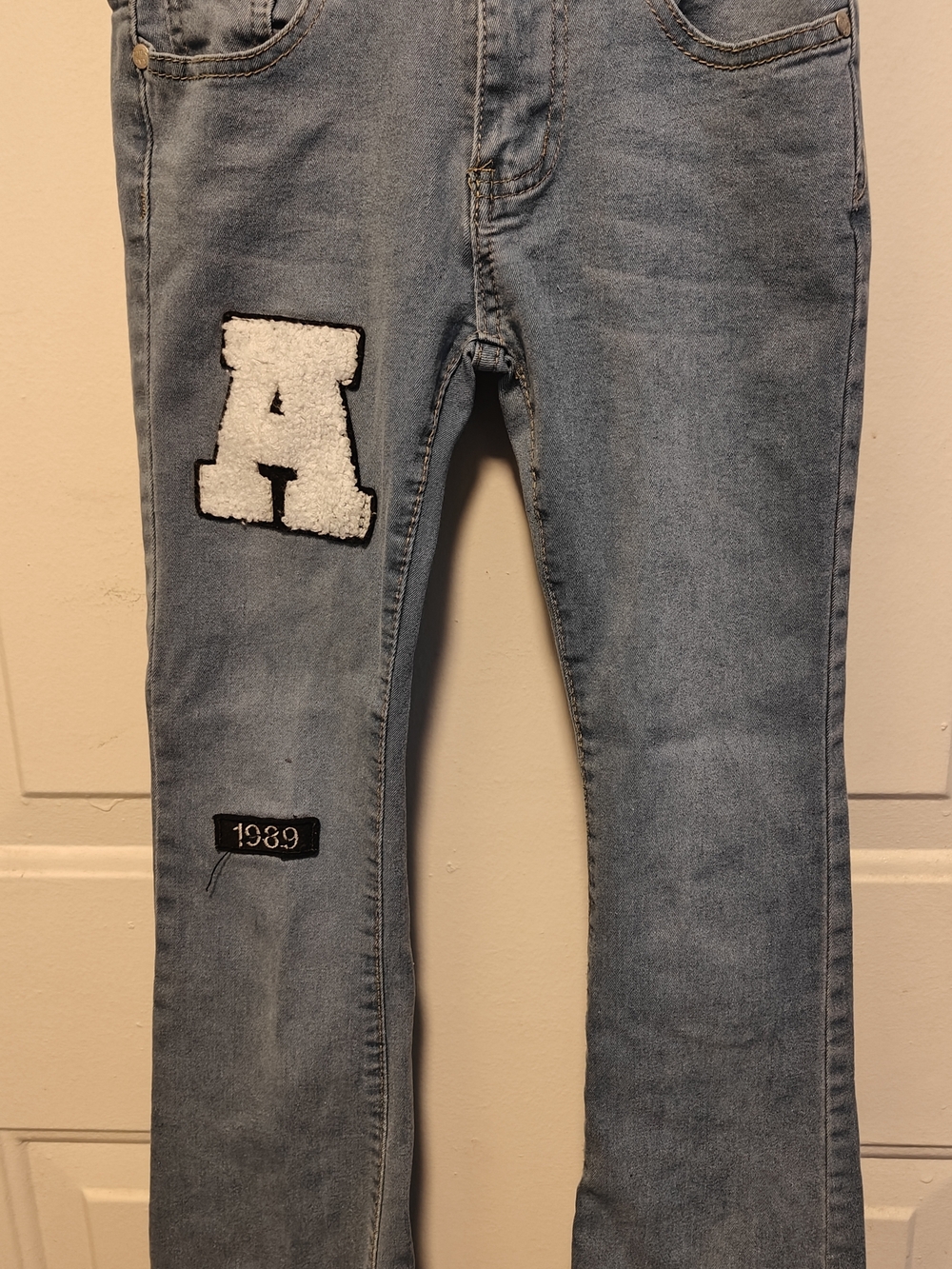 Light Wash Denim Jeans with White Chenille 'A' Patch